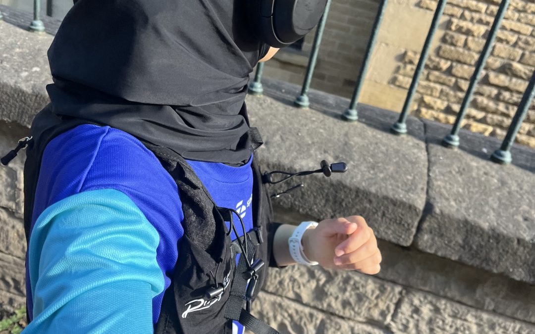 woman in a headscarf with headphones on