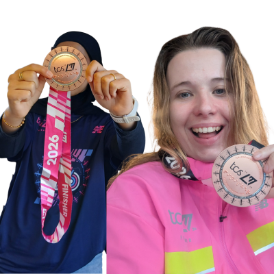 Marathon runners holding medals